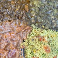 4 choice combo- soy stew, chickpea and potato curry, peanut stew, fried rice  at Zionly Manna in South East London