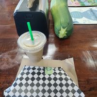 Vegan wrap, mango java, and a huge zucchini! at Country Organics in Redding