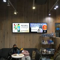 Seating (not a lot, but a welcome place to sit for this tired couple of tourists) at Juice Press - Hell's Kitchen in New York City