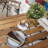 Vegan matcha chocolate cheesecake with some tasty coffee on the side at O Xexexe in Costa Da Caparica