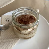 Tiramisu. Fire 🔥   at Alfarroba Cafe in Albufeira