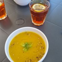 Creamy leek soup with roobios ice tea at Alfarroba Cafe in Albufeira