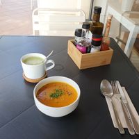 Pumpkin soup as starter with matcha latte soya at Alfarroba Cafe in Albufeira