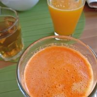 Freshly made orange and carrot juice at Alfarroba Cafe in Albufeira