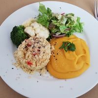 Plate of the day, squash and lentil puree with bulgur and veggies at Alfarroba Cafe in Albufeira