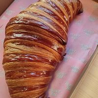 Giant croissant at Hey Plant Bae in Edinburgh