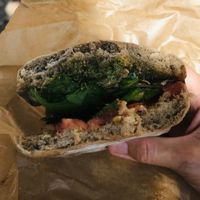 Vegetarian sandwich made vegan without cheese, delicious homemade pesto and roasted veg at PiqNiq in Menorca