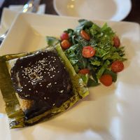 Tamal de mole negra at Le Campane in Oaxaca