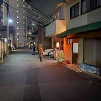 Street side entrance at night. Look out for red ラメン lantern at Vegan Ramen Towzen in Kyoto