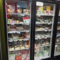 Fridge full of Spanish and international vegan meats, cheeses, charcuterie, yogurt, tofu... at Nan-yea Market in Madrid