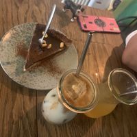 Vegan cheese cake and latte  at Hommage in Cologne