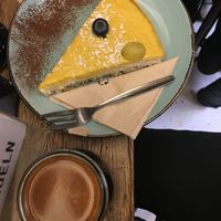 Schwarzer Kaffee mit Mango-Raw-Cake. ✨  at Hommage in Cologne