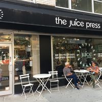Outside of venue, with outdoor seating. at Juice Press - Lenox Hill in New York City
