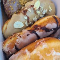 Key Lime, Maple Almond, Vanilla and Chocolate Cardamom donuts at Holey Rollers Bakery in Oklahoma City