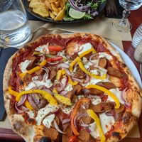 Pizza piquante at Le London in Calais