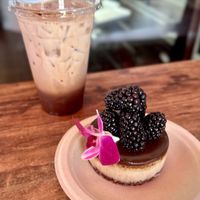 “Vegan Chocolate Coconut Cheesecake” and “Iced Dark Chocolate Mocha Latte” with oat milk   at Sinners & Saints Desserts in Venice