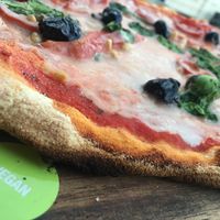 Vegan pizza clearly marked to ensure no mix ups in cooking or delivery  at Zizzi in Bishops Stortford