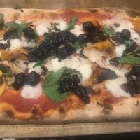 Rustica pizza with extra toppings  at Zizzi in Cheshire Oaks