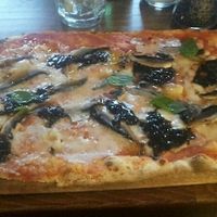 vegan pizza with mushrooms and caramelised unions at Zizzi - Roxburgh Court in Edinburgh
