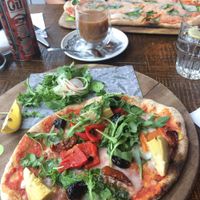 Top Dish - Vegan 'Rustica pizza' with vegan cheese and spinach.

Bottom Dish - Skinny pizza 'Primavera', veganised, with side of naked slaw.

Also featuring Soya milk Coffee. at Zizzi - Birstall in Leeds