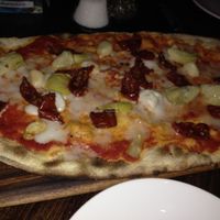 margherita rustica with artichoke, balsamic tomato, and roasted garlic at Zizzi - Canary Wharf in East London
