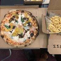 pizza w/ fries at Zizzi - Notting Hill Gate in West London