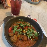 Aubergine meatballs and the cherry mocktail   at Zizzi - St Giles in West London