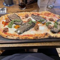 Aubergine and pesto pizza with added meatless meatballs   at Zizzi - The O2 in South East London