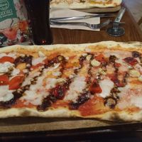 My favourite pizza - balsamic onions, fire roasted red peppers and roasted garlic cloves on a Rustica base. Then drizzled with chilli oil. at Zizzi - Meadowhall in Sheffield