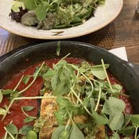Vegan lasagna (foreground) and vegan risotto    at Zizzi in York