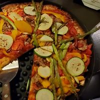 UJs Sunburst pizza, marinara as sauce (is non-dairy), & no cheese. 😍 at Silver Beach Pizza in St Joseph