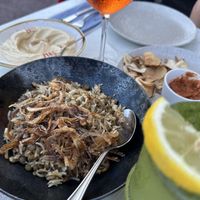 Red drink is Apericol spritz…wife liked it.  at Le Phenicia in Antibes