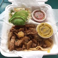Gallitos de seitan with avocado, salsa, chips at La Esquina Vegana in Heredia