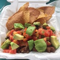 Veggiefrijo bowl 🍲 with chips and avocado at La Esquina Vegana in Heredia