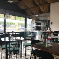 Dining room and counter at La Esquina Vegana in Heredia