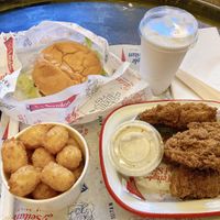Vegan seitan burger and wings, tater tots, and vanilla milkshake  at Temple of Seitan - Hackney in East London