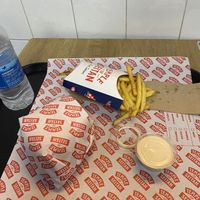 Nashville Hot burger with fries and garlic mayo  at Temple of Seitan - Hackney in East London