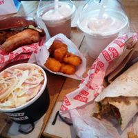 Cole slaw, döner wrap, tater tots, burger and milk shakes at Temple of Seitan - Hackney in East London