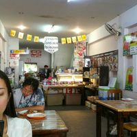 The wife is always on her phone at Jai Mai Jumjay in Chiang Mai