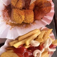 Delicious! Loved the sauce and the sausage!  at Curry at the Wall - Food Stand in Berlin