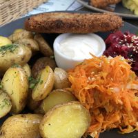 Soy cutlet with potatoes, surowka and vegan cream  at Faloviec Kuchnia Roślinna in Gdansk