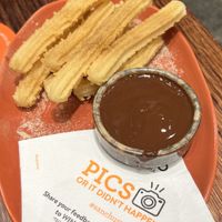 Mini churros with dark chocolate.   at San Churro in Melbourne
