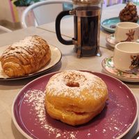 chocolate croissant & filled donut with whipped cream and jam at Frambuesa Pastelería Vegan in Bogota