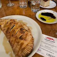Vegan Calzone - Winter squash sauce, Asian pears, red
onions, cauliflower, broccolini, Marcona
almonds, and a maple syrup glaze at Liberty Food & Wine Exchange in Reno