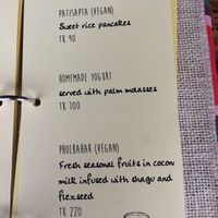 Two desserts are labelled vegan  at Jatra Biroti in Dhaka