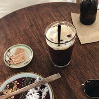 Iced Vietnamese Black Coffee, Açai Bowl and free sugar cookies at Rosie's Cafe in Hoi An