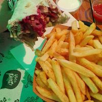 Kebab in a pitta wrap with fries. at What The Pitta in London