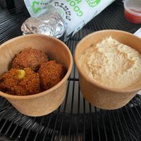 Side of falafel and hummus  at What The Pitta in London