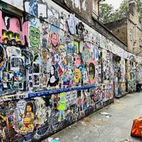On the corner of this alley and Brick Lane   at What The Pitta in London