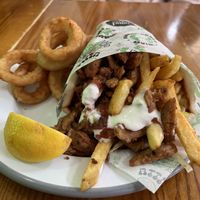 Onion rings and doner gyros yum!   at What The Pitta in London